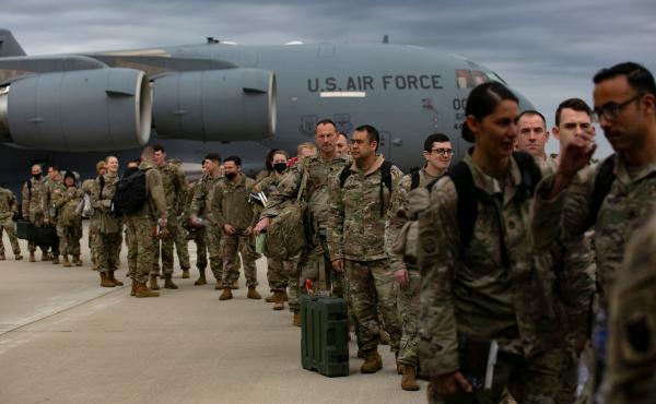 U.S. troops deploy for Europe from Pope Army Airfield at Fort Bragg, N.C., on Feb. 3. U.S. troops deploy for Europe from Pope Army Airfield at Fort Bragg, N.C., on Feb. 3.