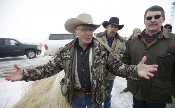 Robert LaVoy Finicum (left), a rancher from Arizona, talks to reporters at the Malheur National Wildlife Refuge near Burns, Ore., in January 2016. His shooting death by state police was found by investigators to be justified. Robert LaVoy Finicum (left), a rancher from Arizona, talks to reporters at the Malheur National Wildlife Refuge near Burns, Ore., in January 2016. His shooting death by state police was found by investigators to be justified.