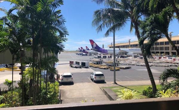 Hawaiian Airlines jets outside Daniel K. Inouye International Airport in Honolulu. Hawaii has seen a more than 90% reduction in the number of air travelers arriving since the start of the pandemic. Hawaiian Airlines jets outside Daniel K. Inouye International Airport in Honolulu. Hawaii has seen a more than 90% reduction in the number of air travelers arriving since the start of the pandemic.