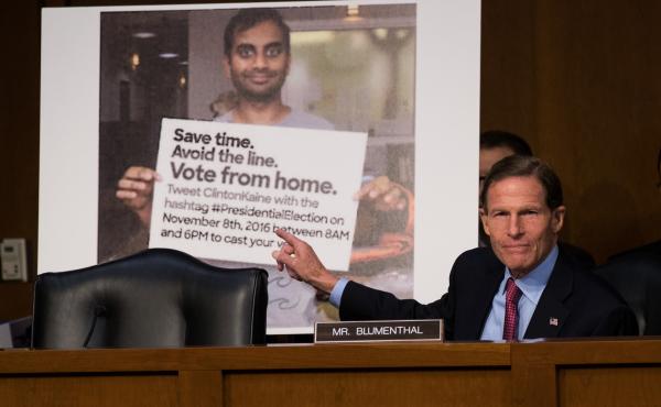 With a Twitter post — including a doctored photo that made it appear as if actor Aziz Ansari was encouraging voters to vote from home — displayed behind him, Sen. Richard Blumenthal, D-Conn. questions witnesses during an October 2017 Senate hearing on With a Twitter post — including a doctored photo that made it appear as if actor Aziz Ansari was encouraging voters to vote from home — displayed behind him, Sen. Richard Blumenthal, D-Conn. questions witnesses during an October 2017 Senate hearing on