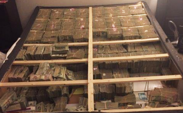 U.S. authorities seized approximately $20 million in cash hidden inside a box spring in apartment in Westborough, Mass., on Jan. 4. U.S. authorities seized approximately $20 million in cash hidden inside a box spring in apartment in Westborough, Mass., on Jan. 4.
