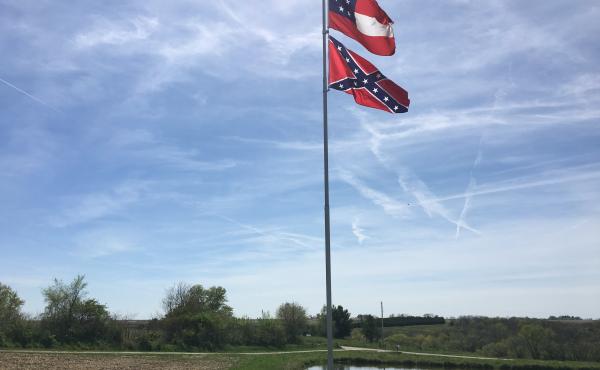 Two different variations of Confederate flags fly in Owen Golay's yard in rural Pleasantville, Iowa. Two different variations of Confederate flags fly in Owen Golay's yard in rural Pleasantville, Iowa.
