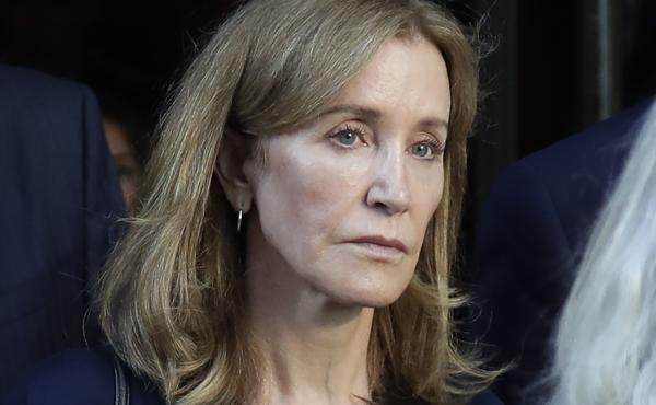 Actress Felicity Huffman leaves federal court after her sentencing in a nationwide college admissions bribery scandal in Boston last month. Actress Felicity Huffman leaves federal court after her sentencing in a nationwide college admissions bribery scandal in Boston last month.