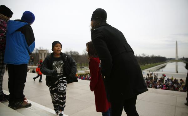 After speaking (or, more often, shouting) their lines, the students run back to congratulatory teachers. After speaking (or, more often, shouting) their lines, the students run back to congratulatory teachers.