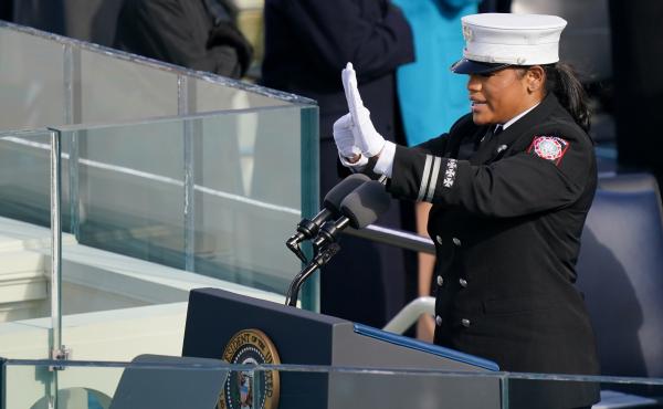 Capt. Andrea Hall, a firefighter from Fulton County, Ga., delivers the pledge of allegiance during the 59th Presidential Inauguration on Wednesday. Capt. Andrea Hall, a firefighter from Fulton County, Ga., delivers the pledge of allegiance during the 59th Presidential Inauguration on Wednesday.