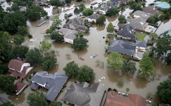 Flooded houses near Lake Houston on Aug. 30, after the storm called Harvey swept through. Sociologist Clare Cooper Marcus says our homes hold our emotional history — our memories, our hopes, our dreams and pain. In some ways our homes are who we are. Flooded houses near Lake Houston on Aug. 30, after the storm called Harvey swept through. Sociologist Clare Cooper Marcus says our homes hold our emotional history — our memories, our hopes, our dreams and pain. In some ways our homes are who we are.