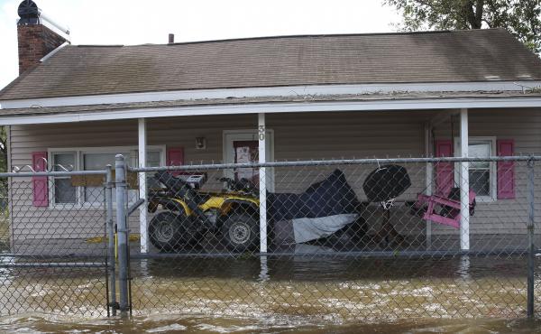 A house is surrounded by flood water in Lumberton, N.C., on Monday. A house is surrounded by flood water in Lumberton, N.C., on Monday.