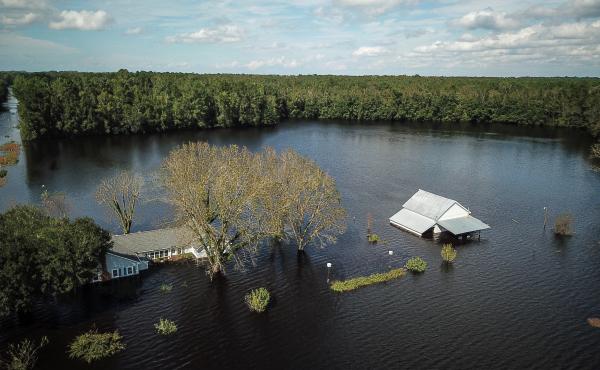 A flooded farm stands next to the Lumber River on Monday in this aerial photograph taken after Hurricane Florence hit Lumberton, N.C. A flooded farm stands next to the Lumber River on Monday in this aerial photograph taken after Hurricane Florence hit Lumberton, N.C.