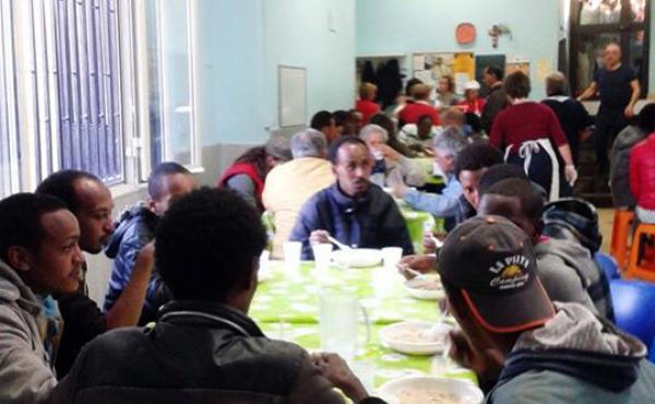 Hundreds of migrants have found support at the mess hall of the Caritas help center in Catania, where one volunteer says the crisis is pitting the poor against the poor, referring to homeless Italians and the newly arrived migrants. Hundreds of migrants have found support at the mess hall of the Caritas help center in Catania, where one volunteer says the crisis is pitting the poor against the poor, referring to homeless Italians and the newly arrived migrants.