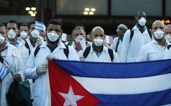 More than 50 doctors and paramedics arrived in Milan from Cuba on March 22 to help with coronavirus treatment. More than 50 doctors and paramedics arrived in Milan from Cuba on March 22 to help with coronavirus treatment.
