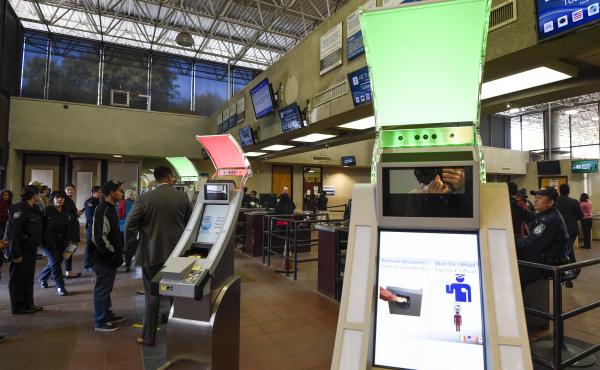 Pedestrians crossing from Mexico into the United States at the Otay Mesa Port of Entry wait to use biometric kiosks in San Diego. A new study says visa overstays exceeded illegal border crossings. Pedestrians crossing from Mexico into the United States at the Otay Mesa Port of Entry wait to use biometric kiosks in San Diego. A new study says visa overstays exceeded illegal border crossings.
