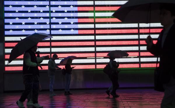 People holding umbrellas walk through New York City's Times Square in 2019. The U.S. Census Bureau plans to change how it protects the confidentiality of people's information in the detailed demographic data it produces through the 2020 count. People holding umbrellas walk through New York City's Times Square in 2019. The U.S. Census Bureau plans to change how it protects the confidentiality of people's information in the detailed demographic data it produces through the 2020 count.