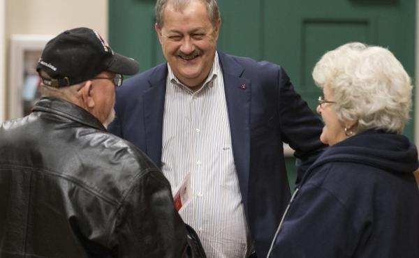 Former Massey CEO and West Virginia Republican Senatorial candidate Don Blankenship, greets supporters Doug Smith, left, and Wanda Smith, right, prior to a town hall in Logan, W.Va., on Jan. 18. Former Massey CEO and West Virginia Republican Senatorial candidate Don Blankenship, greets supporters Doug Smith, left, and Wanda Smith, right, prior to a town hall in Logan, W.Va., on Jan. 18.
