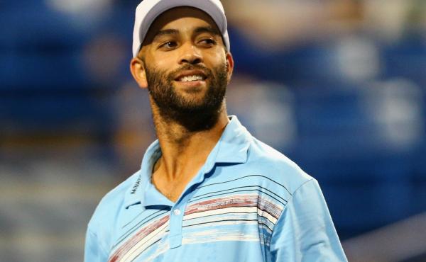 In this Aug. 27 photo, retired tennis player James Blake looks on during a "legends" match against Andy Roddick. In this Aug. 27 photo, retired tennis player James Blake looks on during a "legends" match against Andy Roddick.