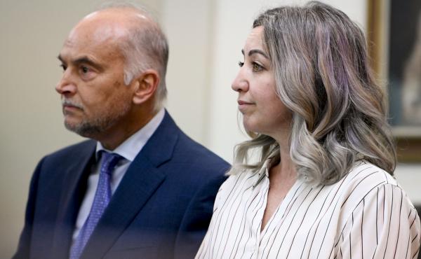RaDonda Vaught and her attorney, Peter Strianse, listen as verdicts are read at her trial in Nashville, Tenn., on Friday, March 25. The jury found Vaught, a former nurse, guilty of criminally negligent homicide and gross neglect of an impaired adult in th RaDonda Vaught and her attorney, Peter Strianse, listen as verdicts are read at her trial in Nashville, Tenn., on Friday, March 25. The jury found Vaught, a former nurse, guilty of criminally negligent homicide and gross neglect of an impaired adult in th