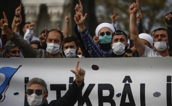Demonstrators chant slogans during an anti-France protest in Istanbul on Sunday, as tensions rise between the two countries. Demonstrators chant slogans during an anti-France protest in Istanbul on Sunday, as tensions rise between the two countries.