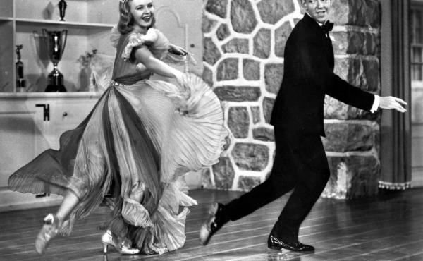 Fred Astaire and Ginger Rogers gave Americans a much-needed on-screen escape in the 1930s. Above, they dance in the 1938 comedy musical Carefree. Fred Astaire and Ginger Rogers gave Americans a much-needed on-screen escape in the 1930s. Above, they dance in the 1938 comedy musical Carefree.