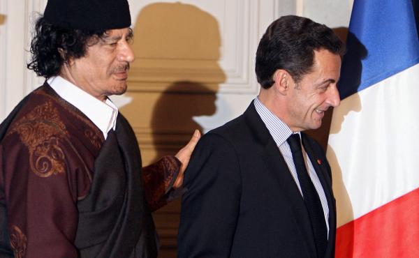 French President Nicolas Sarkozy (right) and Libyan leader Moammar Gadhafi leave the Elysee Palace after the signature of 10 billion euros of trade contracts between the two countries, in December 2007 in Paris. French President Nicolas Sarkozy (right) and Libyan leader Moammar Gadhafi leave the Elysee Palace after the signature of 10 billion euros of trade contracts between the two countries, in December 2007 in Paris.
