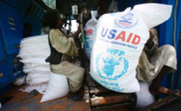 Sudanese dockers unload a U.S. aid shipment at Port Sudan on the Red Sea coast on May 5. Sudanese dockers unload a U.S. aid shipment at Port Sudan on the Red Sea coast on May 5.