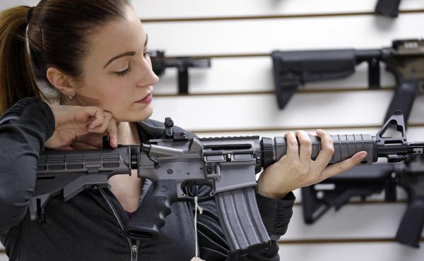 Gun shop owner Tiffany Teasdale-Causer demonstrates a Ruger AR-15 semi-automatic rifle. The Supreme Court hasn't ruled on whether assault-style weapons can be banned. Gun shop owner Tiffany Teasdale-Causer demonstrates a Ruger AR-15 semi-automatic rifle. The Supreme Court hasn't ruled on whether assault-style weapons can be banned.
