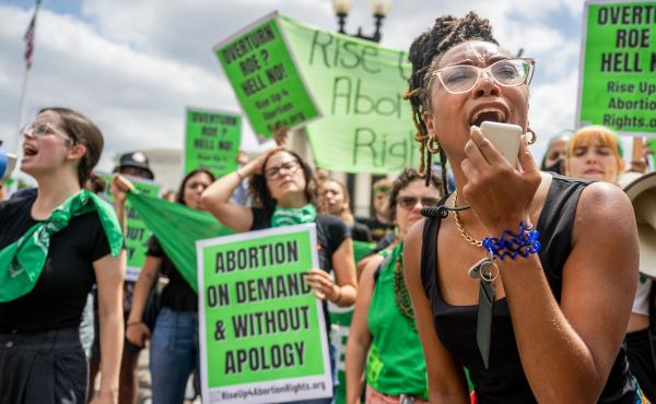 Abortion rights demonstrator Elizabeth White leads a chant in response to the Dobbs v. Jackson Women's Health Organization ruling in front of the U.S. Supreme Court on June 24, 2022. Abortion rights demonstrator Elizabeth White leads a chant in response to the Dobbs v. Jackson Women's Health Organization ruling in front of the U.S. Supreme Court on June 24, 2022.