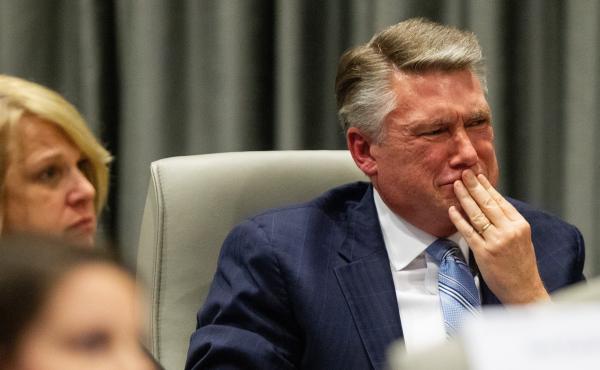 Mark Harris, Republican candidate in North Carolina's 9th Congressional race, fights back tears at the conclusion of his son John Harris's testimony during the third day of a North Carolina State Board of Elections hearing on the 9th Congressional Distric Mark Harris, Republican candidate in North Carolina's 9th Congressional race, fights back tears at the conclusion of his son John Harris's testimony during the third day of a North Carolina State Board of Elections hearing on the 9th Congressional Distric