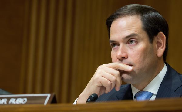 Florida Republican Sen. Marco Rubio, shown in July, had threatened a "no" vote on the bill because he wanted a more generous child tax credit for working families. He said Friday he will vote for the measure. Florida Republican Sen. Marco Rubio, shown in July, had threatened a "no" vote on the bill because he wanted a more generous child tax credit for working families. He said Friday he will vote for the measure.