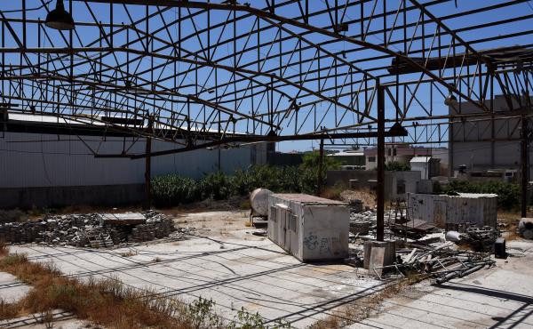 Faysal Shawa's warehouse was damaged in the 2014 conflict. Shawa and employees maintain no connection to Hamas. Faysal Shawa's warehouse was damaged in the 2014 conflict. Shawa and employees maintain no connection to Hamas.