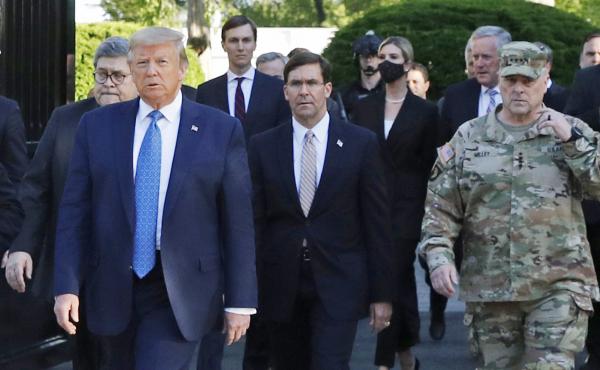 Gen. Mark Milley (right) appears with President Trump as he departs the White House en route to St. John's Church on June 1. Milley now says his presence "created a perception of the military involved in domestic politics." Gen. Mark Milley (right) appears with President Trump as he departs the White House en route to St. John's Church on June 1. Milley now says his presence "created a perception of the military involved in domestic politics."