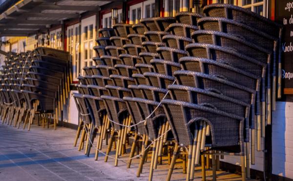 Chairs are piled up outside a restaurant Monday in the Baltic Sea resort town of Haffkrug, Germany. Chairs are piled up outside a restaurant Monday in the Baltic Sea resort town of Haffkrug, Germany.