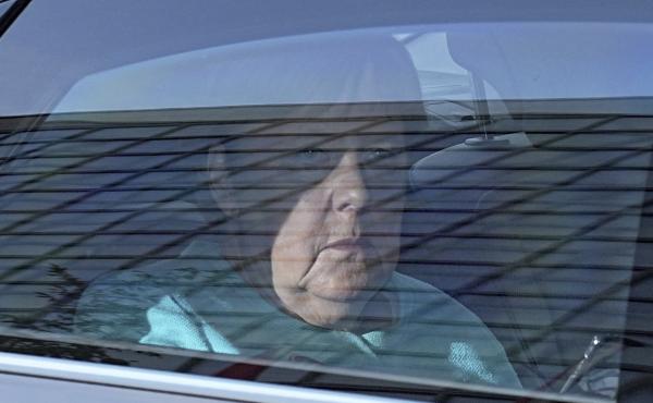 German Chancellor Angela Merkel arrives at the Konrad Adenauer House in Berlin, Germany, Sunday, Sept. 26, 2021. German voters are choosing a new parliament in an election that will determine who succeeds Chancellor Angela Merkel after her 16 years at the German Chancellor Angela Merkel arrives at the Konrad Adenauer House in Berlin, Germany, Sunday, Sept. 26, 2021. German voters are choosing a new parliament in an election that will determine who succeeds Chancellor Angela Merkel after her 16 years at the