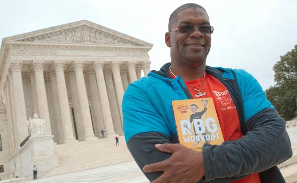 Bryant Johnson, who was Justice Ruth Bader Ginsburg's personal trainer, poses at the court in 2017 with his book, "The RBG Workout: How She Stays Strong ... and You Can Too!" Bryant Johnson, who was Justice Ruth Bader Ginsburg's personal trainer, poses at the court in 2017 with his book, "The RBG Workout: How She Stays Strong ... and You Can Too!"