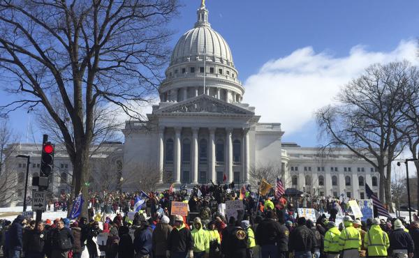 Hundreds of union members rally outside the Capitol in Madison on Tuesday to oppose a Republican-led measure that would make Wisconsin a right-to-work state. Hundreds of union members rally outside the Capitol in Madison on Tuesday to oppose a Republican-led measure that would make Wisconsin a right-to-work state.