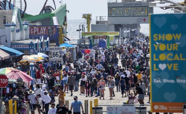 The Santa Monica Pier welcomed outdoor visitors on Monday as Los Angeles County entered the less-restrictive orange tier. The following day, California Gov. Gavin Newsom announced a target statewide reopening date of June 15, provided certain public healt The Santa Monica Pier welcomed outdoor visitors on Monday as Los Angeles County entered the less-restrictive orange tier. The following day, California Gov. Gavin Newsom announced a target statewide reopening date of June 15, provided certain public healt