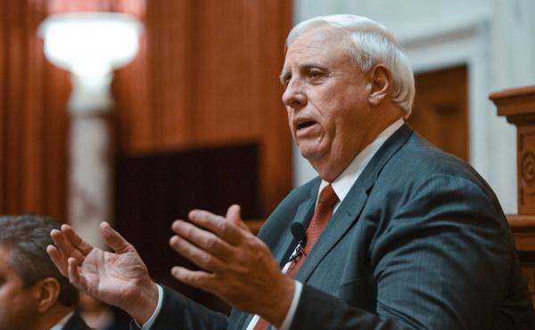 West Virginia Gov. Jim Justice delivers his State of the State speech on Jan. 9 in Charleston, W.Va. Mining companies belonging to the Justice family owe millions in safety violations. West Virginia Gov. Jim Justice delivers his State of the State speech on Jan. 9 in Charleston, W.Va. Mining companies belonging to the Justice family owe millions in safety violations.