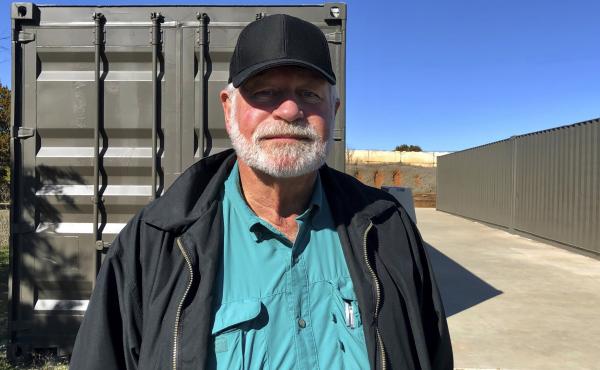 Jack Wilson poses for a photo at a firing range outside his home in Granbury, Texas. Wilson, who trains the volunteer security team of the West Freeway Church of Christ, killed a man who fatally shot two people there on Dec. 29. Jack Wilson poses for a photo at a firing range outside his home in Granbury, Texas. Wilson, who trains the volunteer security team of the West Freeway Church of Christ, killed a man who fatally shot two people there on Dec. 29.
