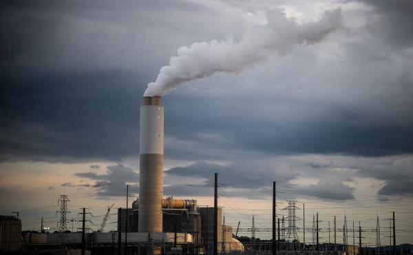 Emissions rise from Duke Energy's coal-fired Asheville power plant in Arden, N.C., in 2018. Emissions rise from Duke Energy's coal-fired Asheville power plant in Arden, N.C., in 2018.