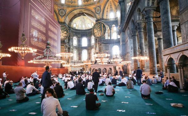 People gather to perform Friday prayers at Istanbul's Hagia Sophia for the first time in 86 years. People gather to perform Friday prayers at Istanbul's Hagia Sophia for the first time in 86 years.