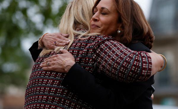 Vice President Kamala Harris hugs Highland Park, Ill., Mayor Nancy Rotering on Tuesday as she visits the site of a shooting Monday that killed seven people. Vice President Kamala Harris hugs Highland Park, Ill., Mayor Nancy Rotering on Tuesday as she visits the site of a shooting Monday that killed seven people.
