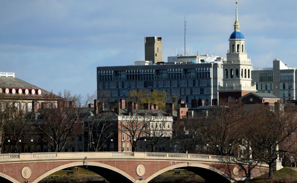 Harvard University President Lawrence Bacow said Thursday that the university will move to end its investments in fossil fuel companies, though stopped short of using the word "divest." Harvard University President Lawrence Bacow said Thursday that the university will move to end its investments in fossil fuel companies, though stopped short of using the word "divest."