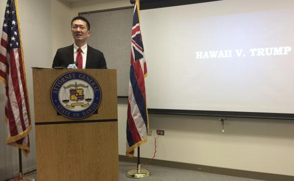 Hawaii Attorney General Doug Chin speaks at a news conference in Honolulu last month. On Tuesday, Chin filed a motion against Trump's revised ban. Hawaii Attorney General Doug Chin speaks at a news conference in Honolulu last month. On Tuesday, Chin filed a motion against Trump's revised ban.