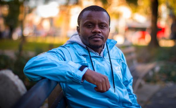 Robert Hakiza, who started a soccer tournament to unite refugees in Africa, sits on a bench in Washington, D.C. Robert Hakiza, who started a soccer tournament to unite refugees in Africa, sits on a bench in Washington, D.C.