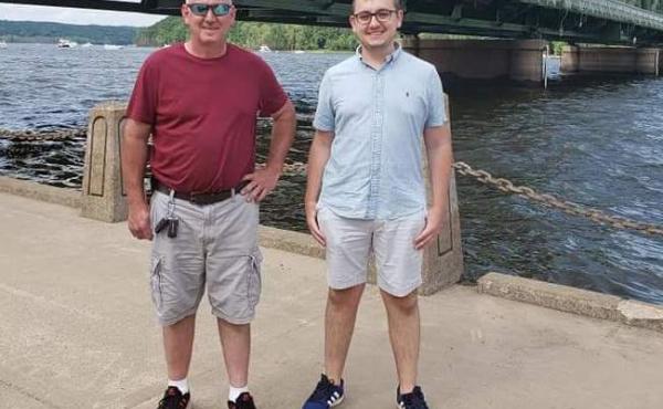 Tyler Skluzacek (right) helped develop a smartwatch app to help disrupt his father Patrick's nightmares. The app recently won approval from the Food and Drug Administration. Tyler Skluzacek (right) helped develop a smartwatch app to help disrupt his father Patrick's nightmares. The app recently won approval from the Food and Drug Administration.