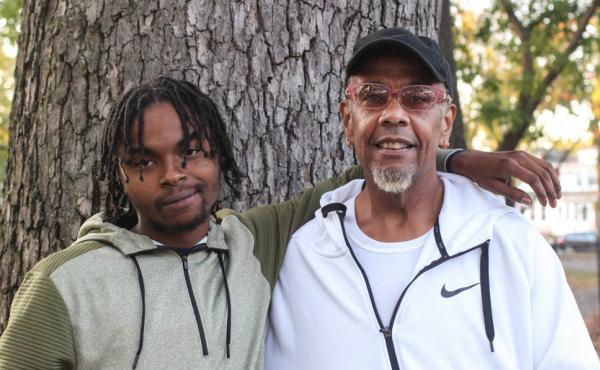 Before Guy Bryant (right) took Romario Vassell (left) into foster care, Vassell had been living in a homeless shelter. Before Guy Bryant (right) took Romario Vassell (left) into foster care, Vassell had been living in a homeless shelter.