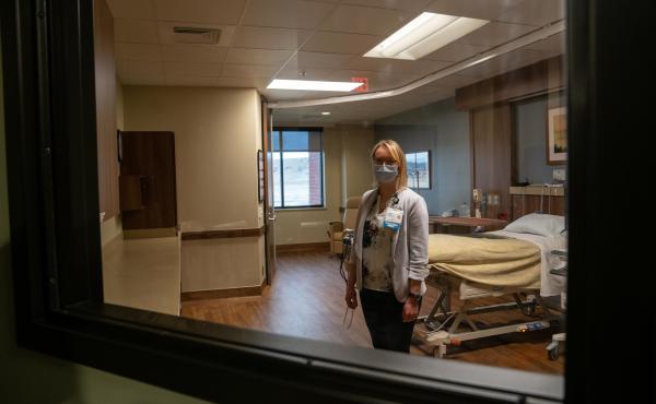 Assistant Director of Nursing Jenn Schmid is in one of Livingston HealthCare's two ICU rooms. Before COVID-19, Schmidt's job was mostly administrative — but she stepped in to fill the hospital's need during the area's coronavirus surges. One duty she to Assistant Director of Nursing Jenn Schmid is in one of Livingston HealthCare's two ICU rooms. Before COVID-19, Schmidt's job was mostly administrative — but she stepped in to fill the hospital's need during the area's coronavirus surges. One duty she to