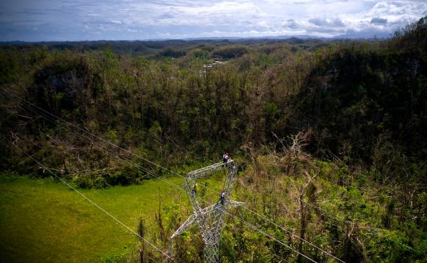 Whitefish Energy workers restore damaged lines in Barceloneta, Puerto Rico, on Oct. 15. A $300 million contract between the tiny company and Puerto Rico's electric authority has come under intense scrutiny. Whitefish Energy workers restore damaged lines in Barceloneta, Puerto Rico, on Oct. 15. A $300 million contract between the tiny company and Puerto Rico's electric authority has come under intense scrutiny.