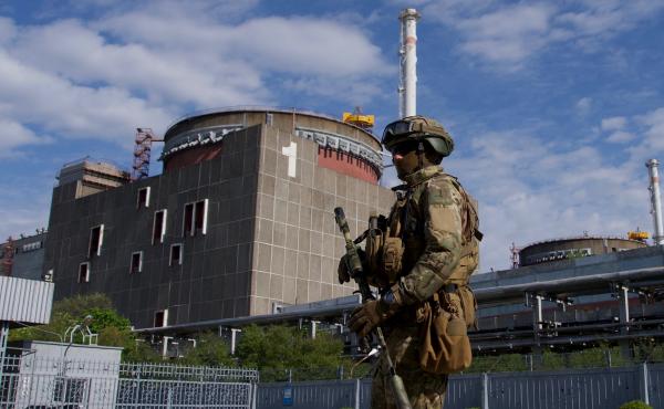 A Russian serviceman patrols Zaporizhzhia Nuclear Power Station on May 1. A series of exchanges in recent weeks has made conditions at the plant more dangerous. A Russian serviceman patrols Zaporizhzhia Nuclear Power Station on May 1. A series of exchanges in recent weeks has made conditions at the plant more dangerous.