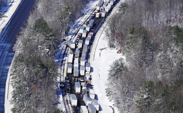 Drivers wait for the traffic to be cleared as cars and trucks are stranded on sections of Interstate 95 Tuesday Jan. 4, 2022, in Carmel Church, Va. Close to 48 miles of the Interstate was closed due to ice and snow. Drivers wait for the traffic to be cleared as cars and trucks are stranded on sections of Interstate 95 Tuesday Jan. 4, 2022, in Carmel Church, Va. Close to 48 miles of the Interstate was closed due to ice and snow.
