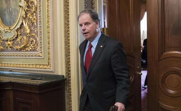 Former Sen. Doug Jones of Alabama, seen here in a 2018 file photo, has been tapped to help President Biden's to-be-named Supreme Court nominee through the Senate confirmation process. Former Sen. Doug Jones of Alabama, seen here in a 2018 file photo, has been tapped to help President Biden's to-be-named Supreme Court nominee through the Senate confirmation process.