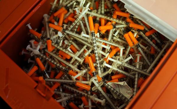 Used syringes rest in a pile at a needle exchange clinic in St. Johnsbury, Vt. The CDC says needle exchanges like this one, where users can obtain clean needles, help reduce the rates of death and transmission among those suffering from hepatitis C. Used syringes rest in a pile at a needle exchange clinic in St. Johnsbury, Vt. The CDC says needle exchanges like this one, where users can obtain clean needles, help reduce the rates of death and transmission among those suffering from hepatitis C.
